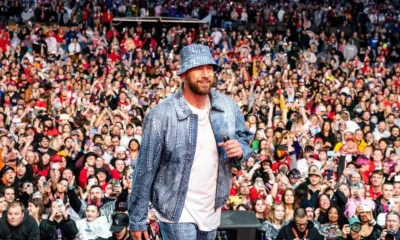 Travis Kelce is showing his love for Taylor Swift at Kelce Jam: The 34-year-old tight end for the Kansas City Chiefs hosted the second year of his music festival this weekend on Saturday, May 18, in Kansas City, featuring performances by Lil Wayne, Diplo, and 2 Chainz