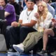 BLURRED LINES: Brittany Mahomes shares pic with Patrick at NBA game but fans only have eyes for Travis Kelce detail in background: The Chiefs tight end was given an unexpected reception from the Mavericks crowd