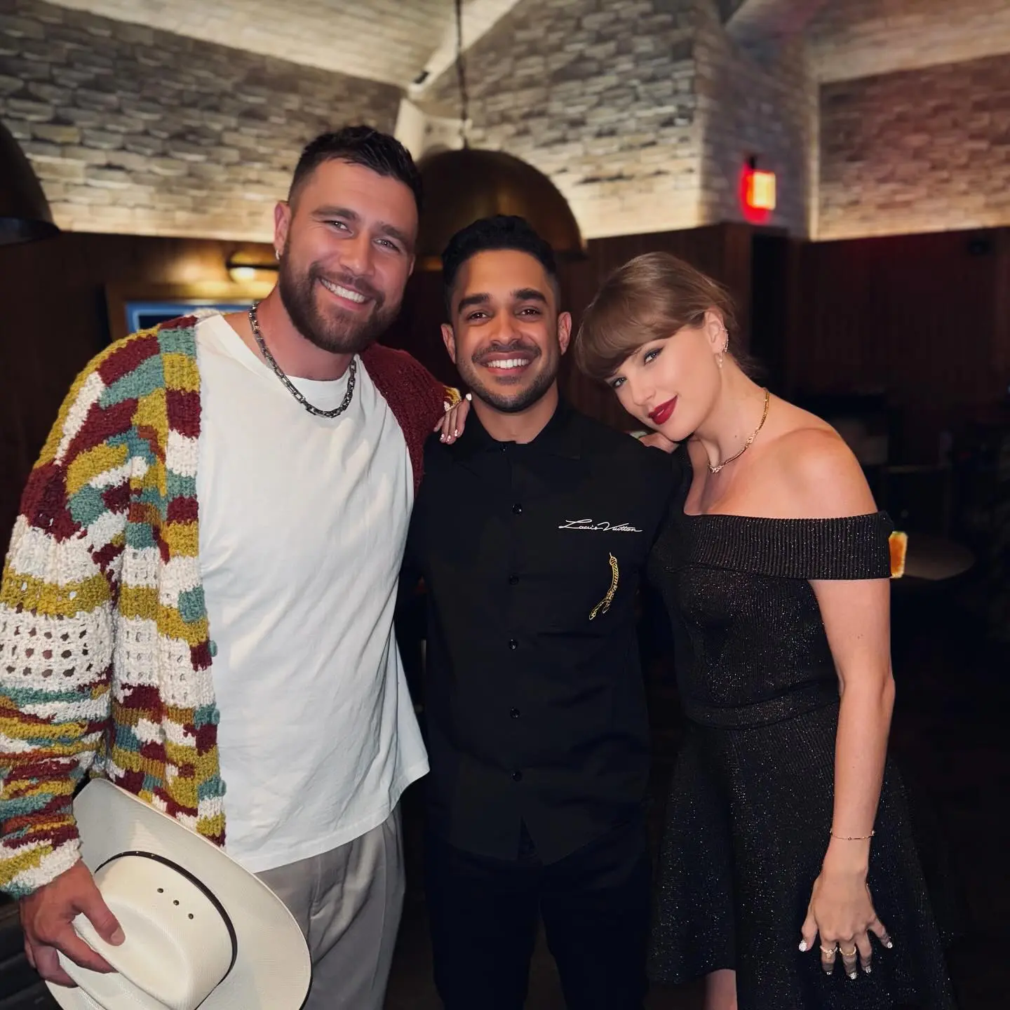 Taylor Swift stepped out for a date night with Travis Kelce donning an off-the-shoulder metallic dress in Las Vegas.