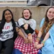 Taylor Swift fans wrap themselves in blankets as hundreds queue for hours in Liverpool to see the pop icon - after her army caused an 'earthquake' at her last Edinburgh gig