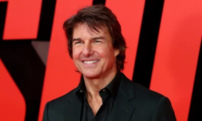 Tom Cruise is a Swiftie! – spotted after Suri's prom: The Mission Impossible star was seen swapping bracelets with fans