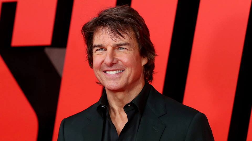 Tom Cruise is a Swiftie! – spotted after Suri's prom: The Mission Impossible star was seen swapping bracelets with fans