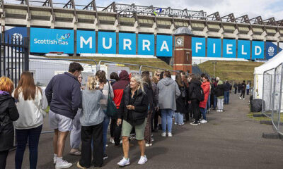 Swiftmania takes over Scotland: Taylor Swift fans skip work and queue hours for merch, sell out hotels and even rename a beauty spot after the star ahead of her first show in Edinburgh on record-breaking Eras Tour