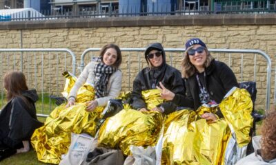 Taylor Swift fans dress up in costumes and wrap themselves in blankets as they brave brisk Edinburgh to queue up hours ahead for singer's third show in Scotland