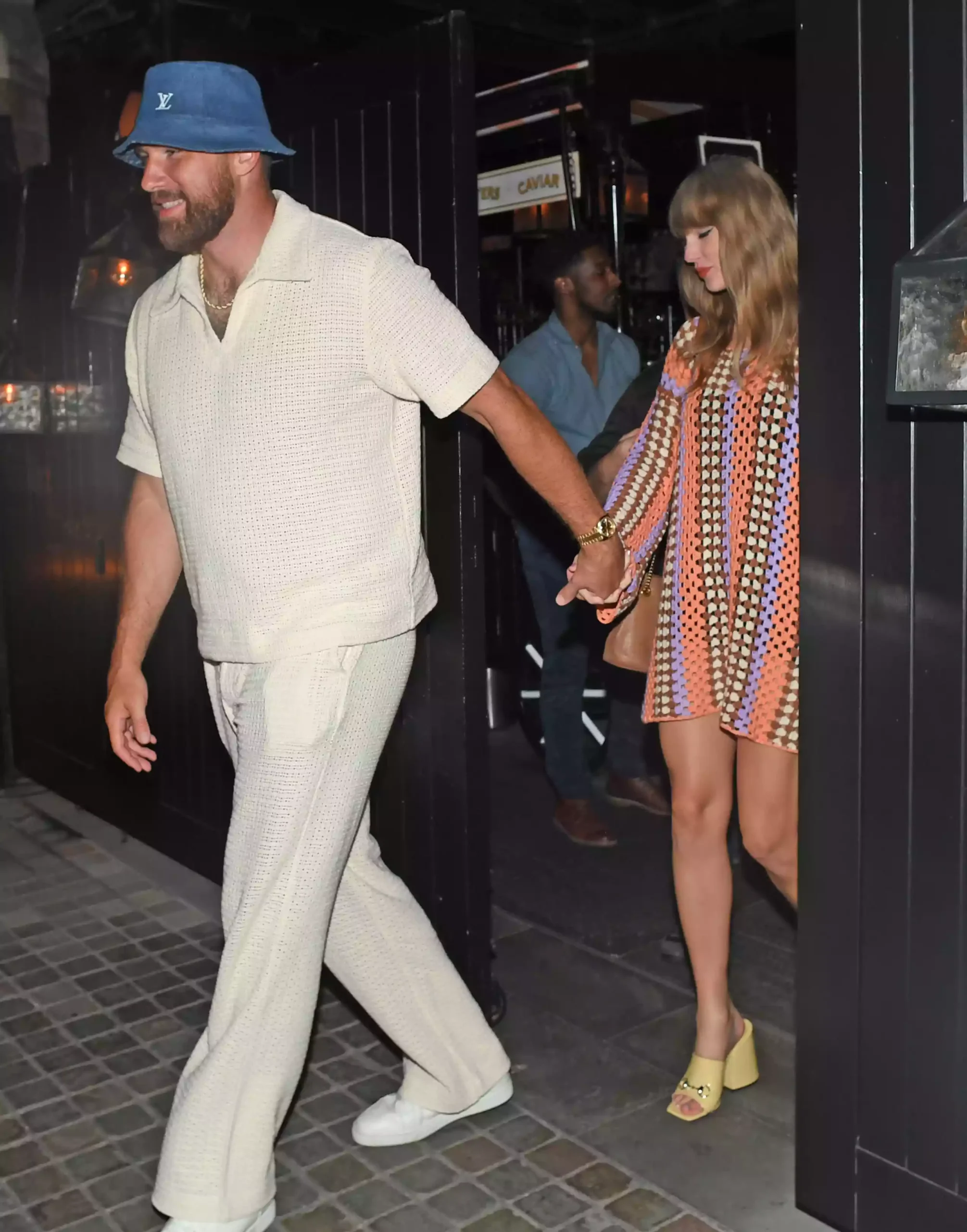 Taylor Swift and Travis Kelce party until 4 a.m. as Swift wore a colorful crochet dress to celebrate at London's Chiltern Firehouse after Kelce joined her on stage ✨ Tap the link below to read more.