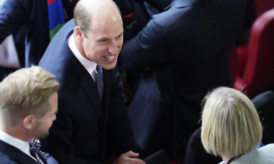 Prince William arrives to cheer on Gareth Southgate's Three Lions as England take on Switzerland in Dusseldorf: Cutting a fine figure in a navy suit and blue tie, the Prince of Wales joined guests in the stands as the England National Team sang 'God Save the Kick' before kick-off.